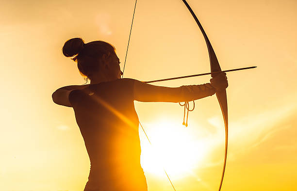 istock Woman shooting with the longbow 481709144