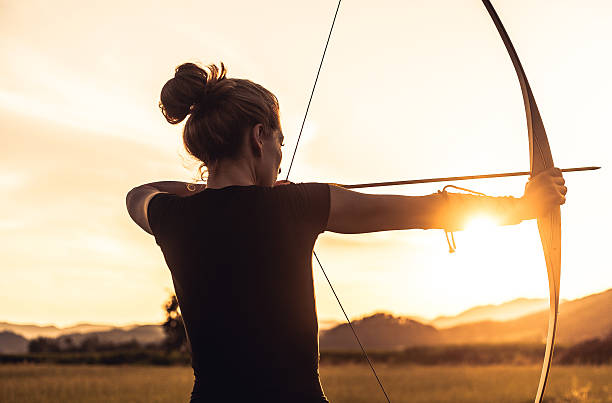 istock Woman shooting with the longbow 481709146