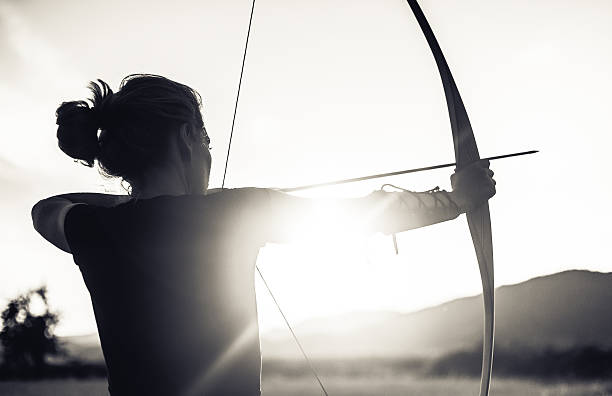 istock Woman shooting with the longbow 481709148