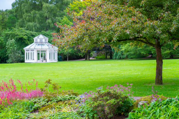 istock Garden Gazebo on big lawn in beautiful park 481709502