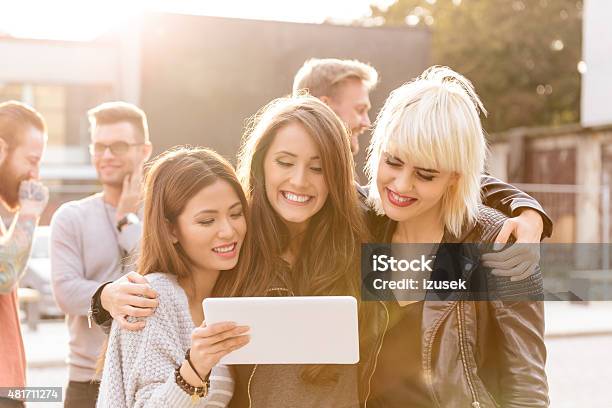 Three Grils Taking Selfie Using A Digital Tablet Stock Photo - Download Image Now - 20-24 Years, 2015, Adult