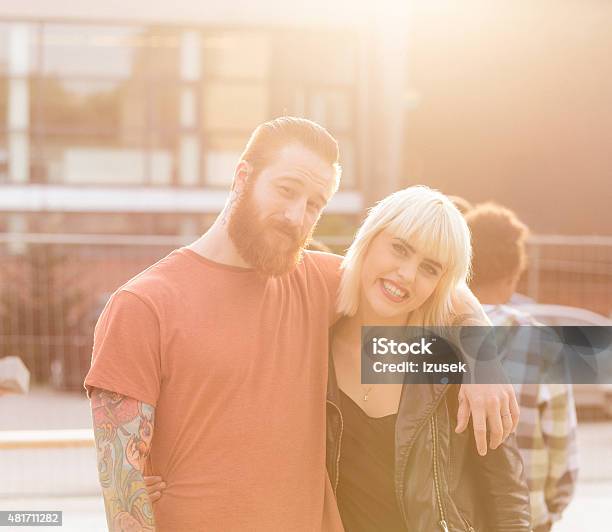 Contemporary Couple Bearded Guy With Tattoos And Blond Girl Stock Photo - Download Image Now