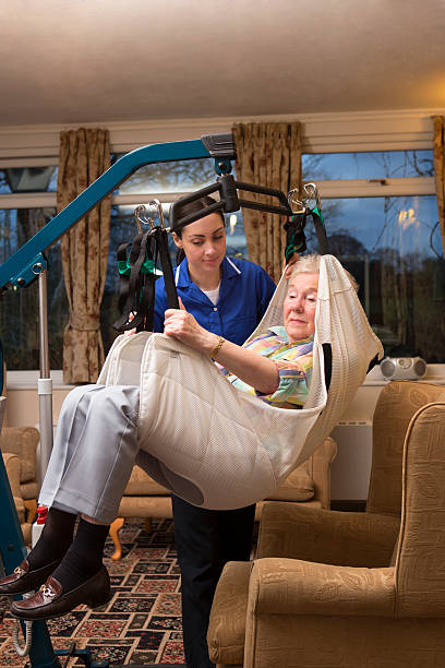 istock Elderly Woman in a Hoist 481713309