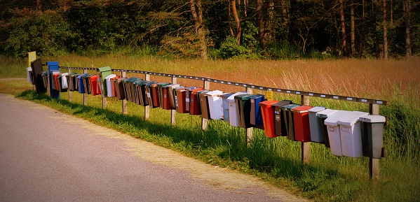 Typical letterboxes gathered at the same place in the Swedish countryside.