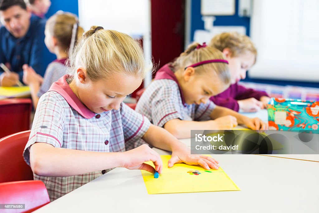 School Children Doing Drawings in the Classroom School children doing drawings in their classroom Australia Stock Photo