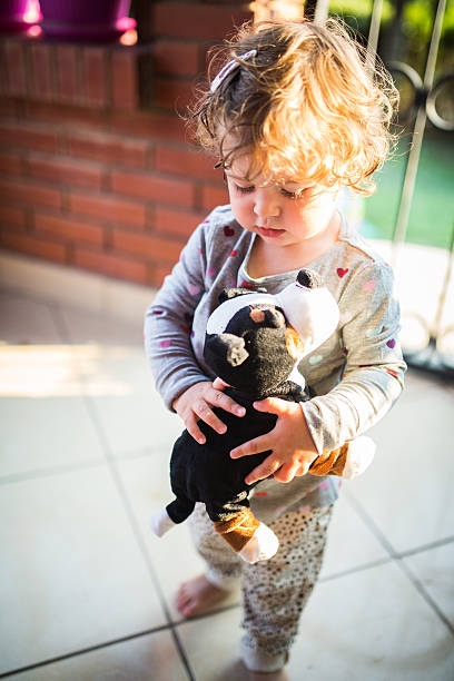 istock Tired baby ready for sleep with favorite toy 481716830