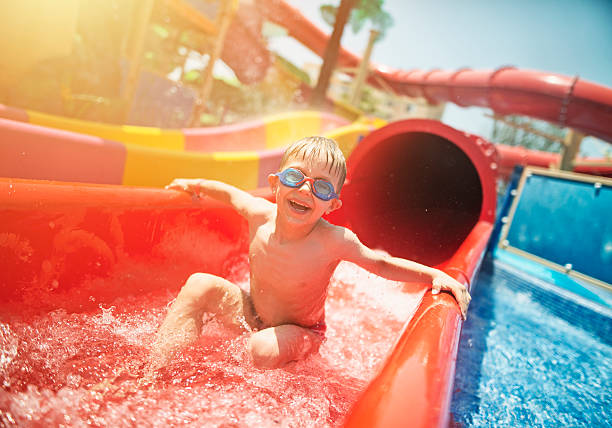 Little girl having fun in aquapark