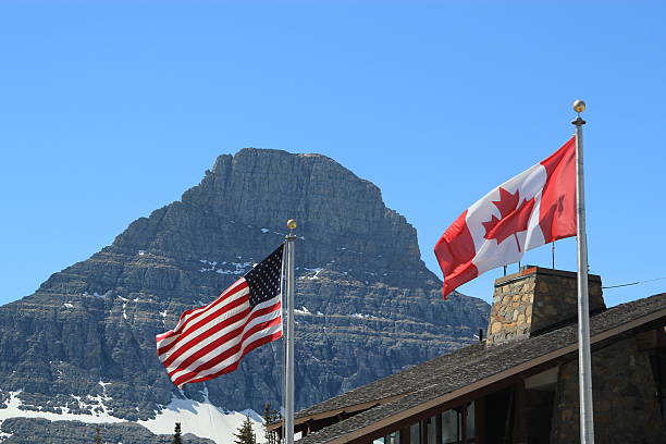 istock American and Canadian flags 481720220