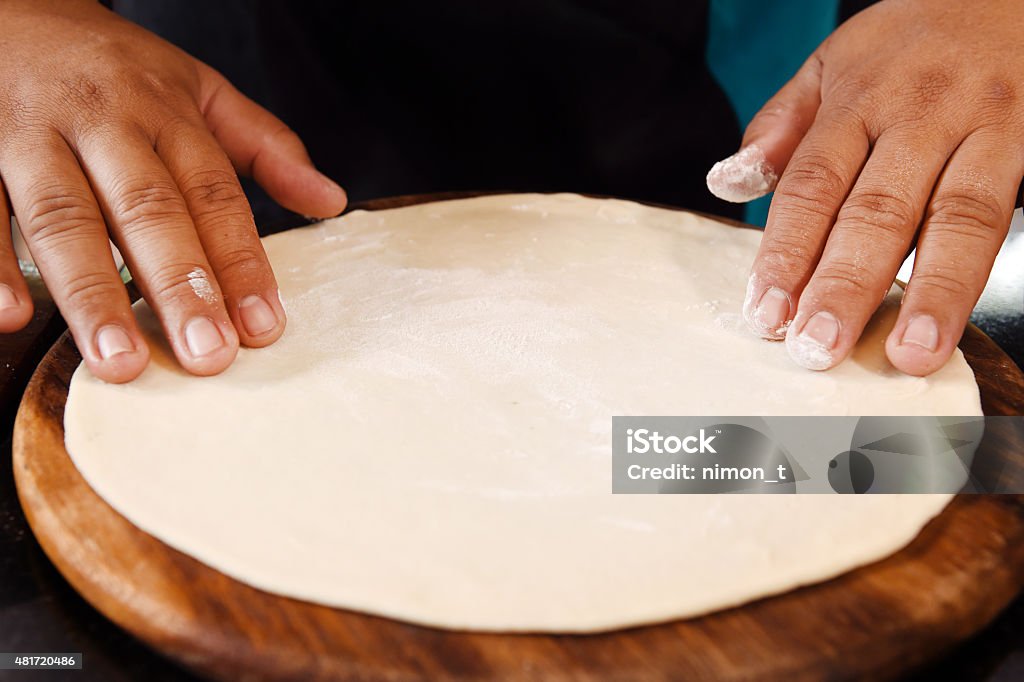 Chef Preparing pizza dough Chef Preparing pizza dough. 2015 Stock Photo