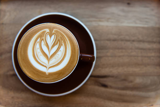 istock Latte Art on Wood Background 481722028