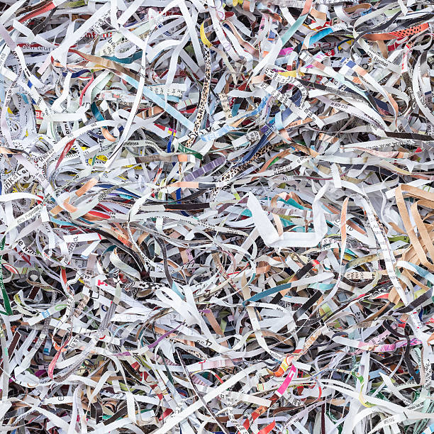 istock Stack of scrap paper from paper cutter for background 481723748