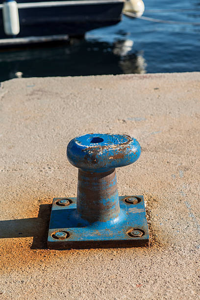 istock Bollard against blurred sea in the harbour 481723930