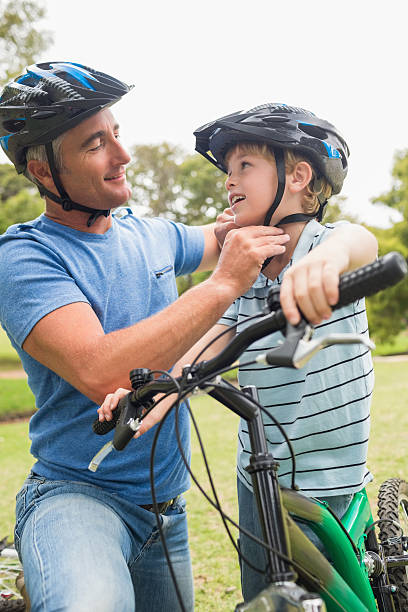 istock Father on a bike with his son 481727156