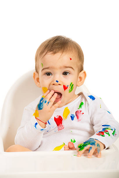 istock Lovely baby with paints on his body 481727989