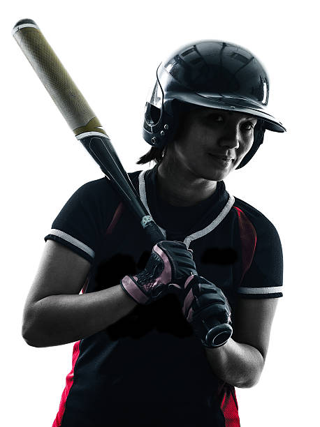 istock woman playing softball players silhouette isolated 481728364