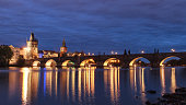 Prague at night Charles Bridge, river and town