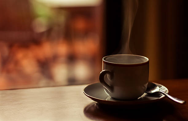 istock Hot, smoking, black italian coffee on wooden table 481729574