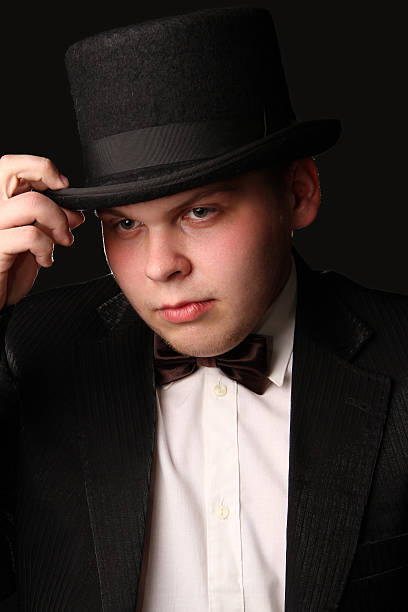 istock the young nice man in a black tuxedo 481729626