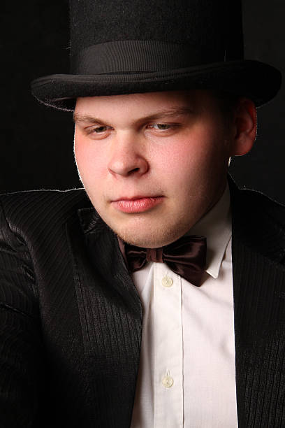 istock the young nice man in a black tuxedo 481729638