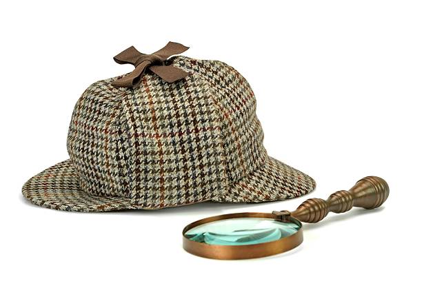 istock Deerstalker Cap And Vintage Magnifying Glass Isolated 481730658