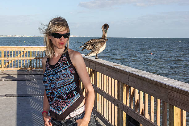 istock Woman with pelican 481730920