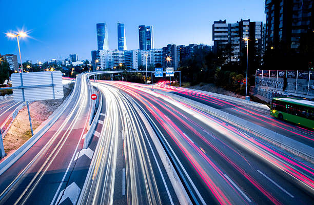 istock Blurred Tail Lights And Traffic Lights On Motorway 481732825