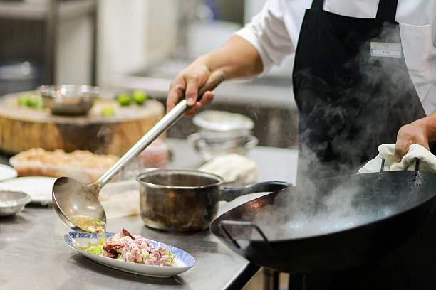 istock Chef cooking sea foood 481734460