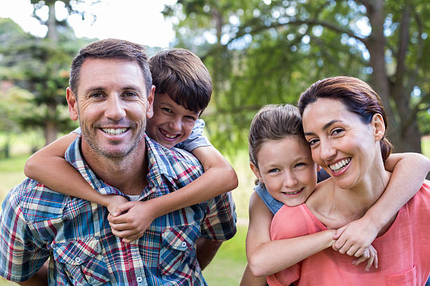 istock Happy family in the park together 481734708