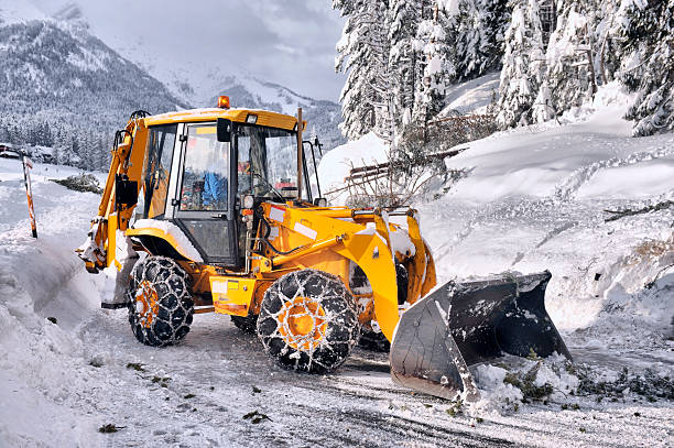 istock clearing roads of snow and fallen tree 481738756