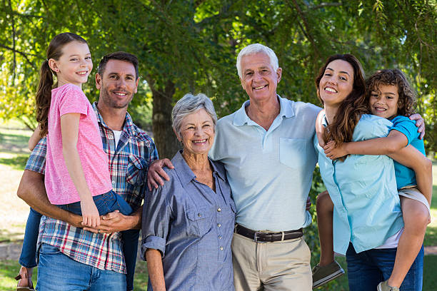 istock Extended family smiling at the camera 481739096