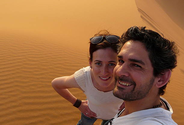 istock Young couple taking a self picture in the desert 481742906