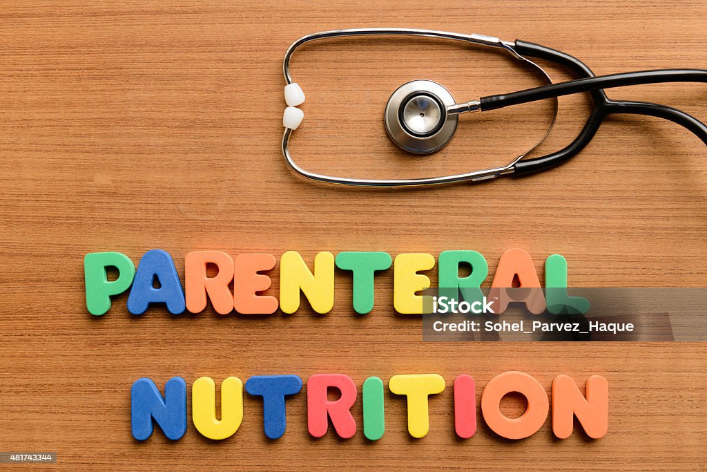 Parenteral nutrition Parenteral nutrition colorful word on the wooden background Healthy Lifestyle Stock Photo