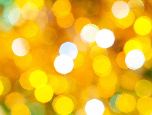 istock bright yellow green shimmering Christmas lights 481743398