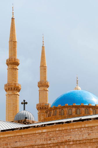 The rooftops of the St. George Orthodox Cathedral and the Mohammad Al-Amin Mosque in Beirut, Lebanon