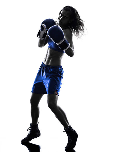 istock woman boxer boxing kickboxing silhouette isolated 481745876