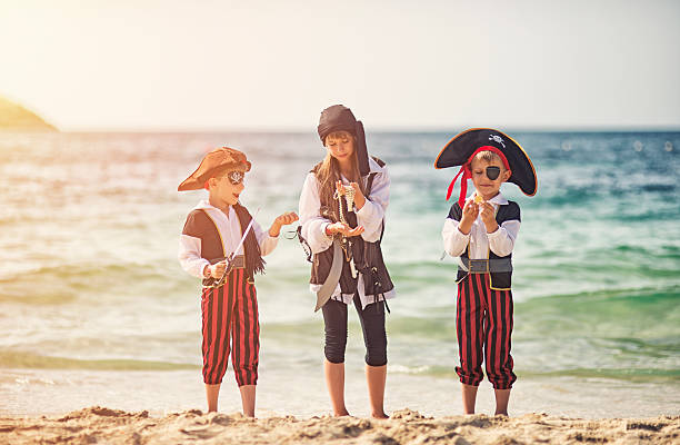 istock Pirate kids enjoying their treasure 481746436