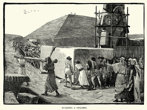 Vintage engraving of Ancient Egyptians building a Pyramid