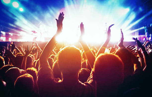 istock People at concert party. 481751256