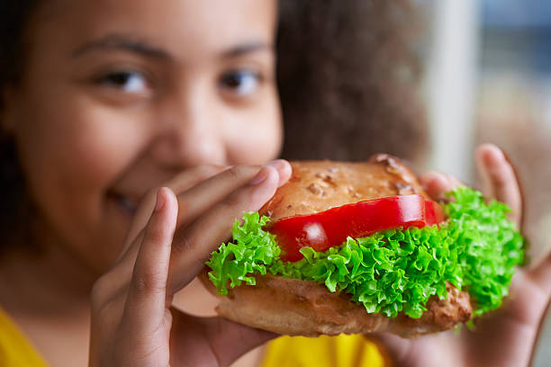 istock Girl with healthy sandwich 481751569