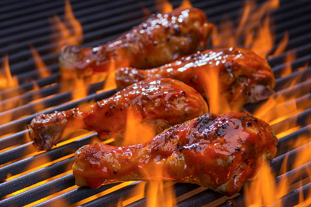 istock Chicken on a hot flaming Barbecue 481752002