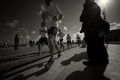 Lisbon, Portugal - June 7, 2014: Runners take part in an urban race in Lisbon downtown.