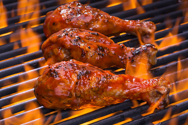 istock Chicken on a hot flaming Barbecue 481754728