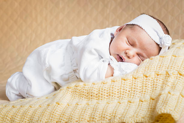 istock Newborn baby girl sleeping 481755040