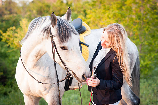 istock girl and a horse 481755212