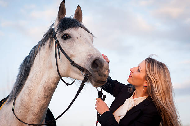 istock girl and a horse 481755218