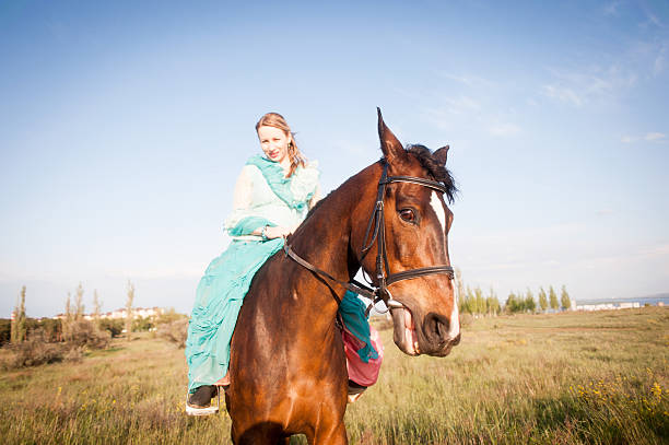 istock Horsewoman and blue sky 481755250