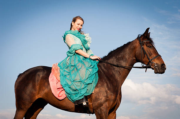 istock Horsewoman and blue sky 481755252