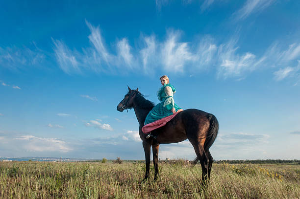istock Horsewoman and blue sky 481755258