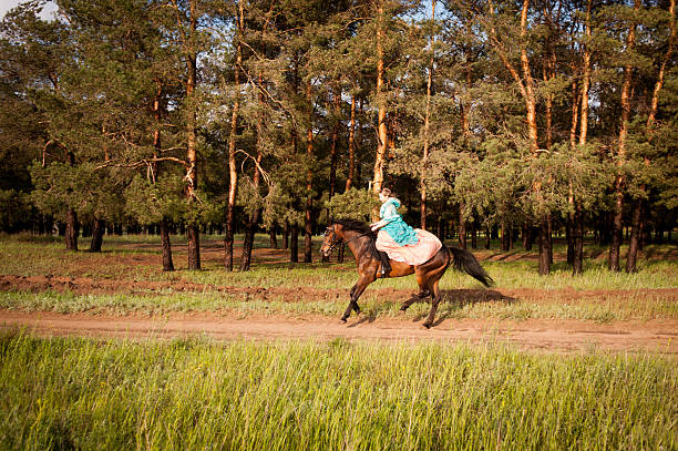 istock Horsewoman riding. 481755262