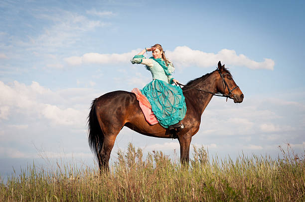 istock Horsewoman and blue sky 481755276